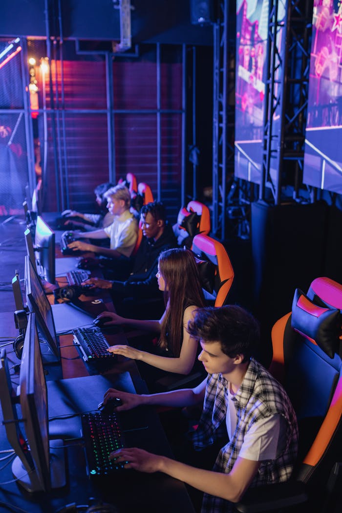 Offerings Group of diverse eSports players intensely focused in a competitive gaming environment.