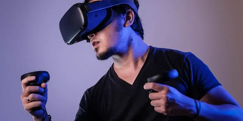 a guy playing games using vr tools